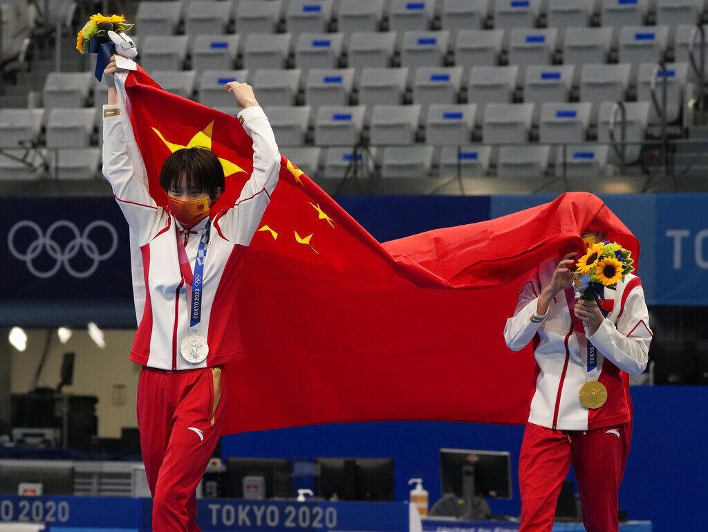 Tokyo Olympics Athletes and Flags Photo Gallery